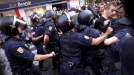 Enfrentamientos en Madrid entre manifestantes y policias. Foto: EFE title=