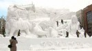 Japanese enjoy sculpture spectacle at annual snow festival