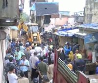 Al menos once muertos al caer un edificio sobre otro en Bombay
