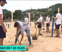 Comienzan a colocar los postes para los toldos en las playas de San Sebastián