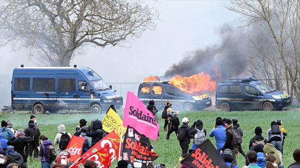 An injured protester at an environmental protest in France is torn between life and death